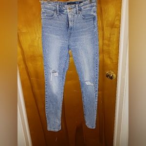 Nice Ladies Lucky Brand size 4 distressed jeans